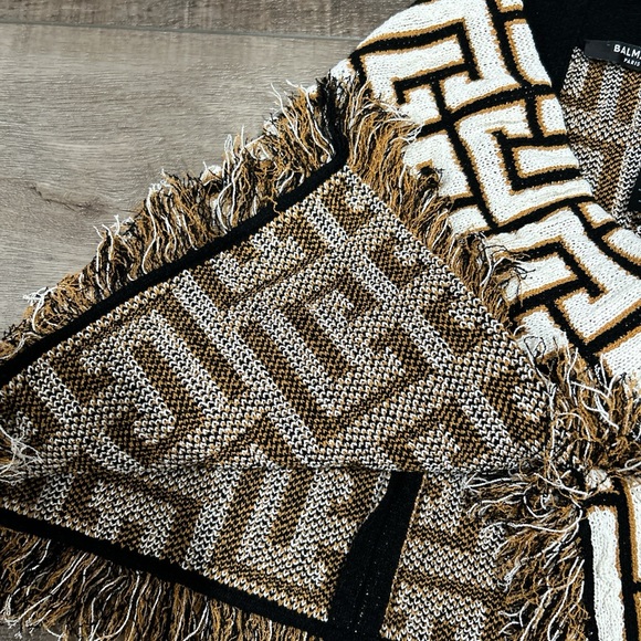 Balmain wrap effect fringed monogram knit logo mini skirt in noir and naturel - Picture 6 of 9